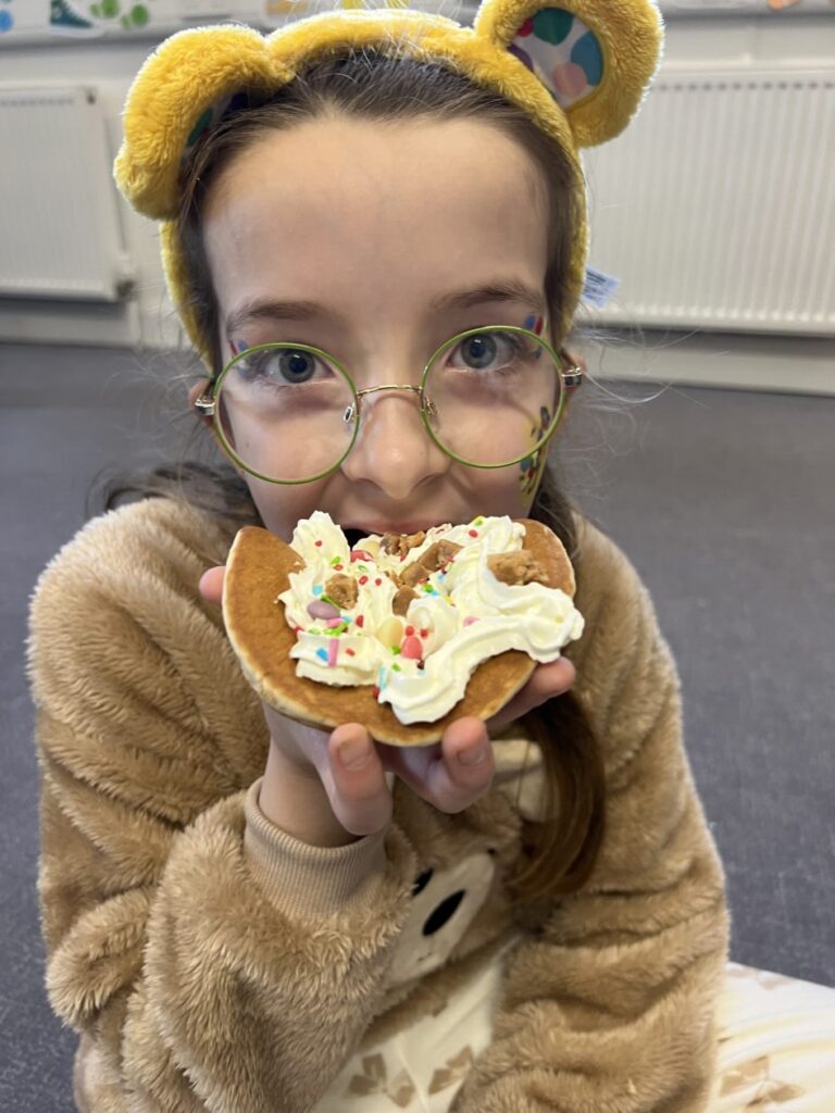 Emma enjoying some pancake!
