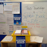 Teachers' CPD board and free book to collect.
