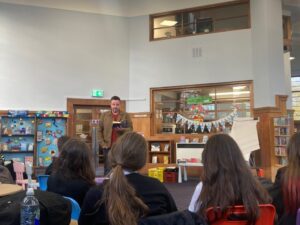 author reading to pupils