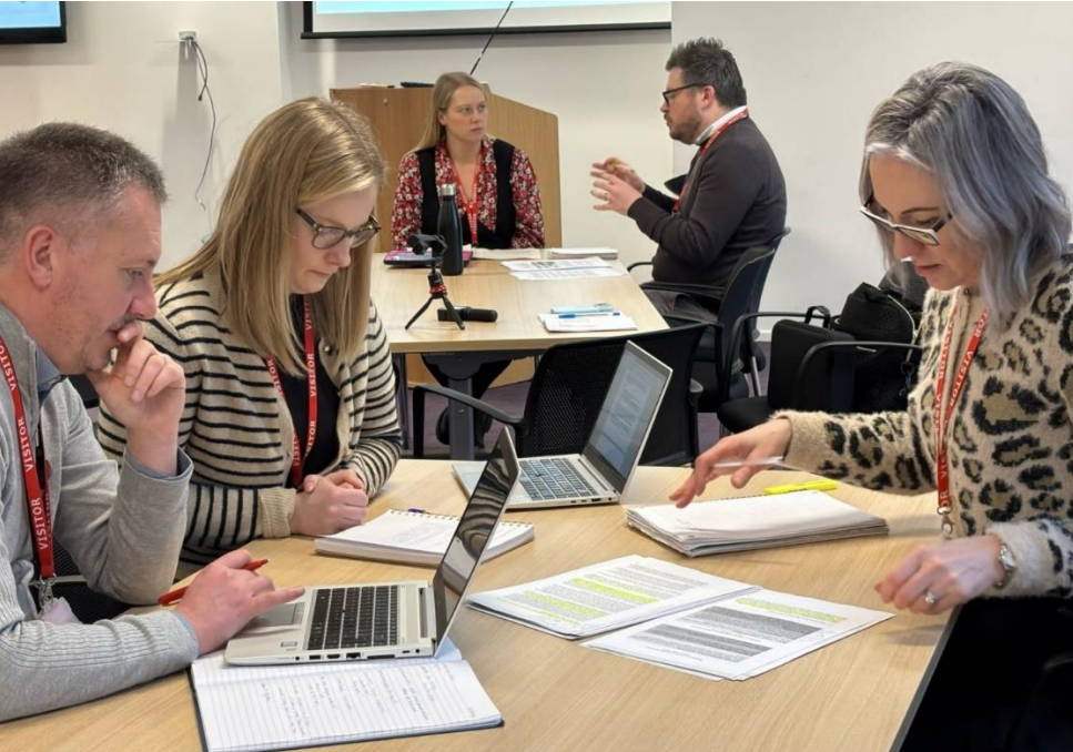 image of teachers in active discussion