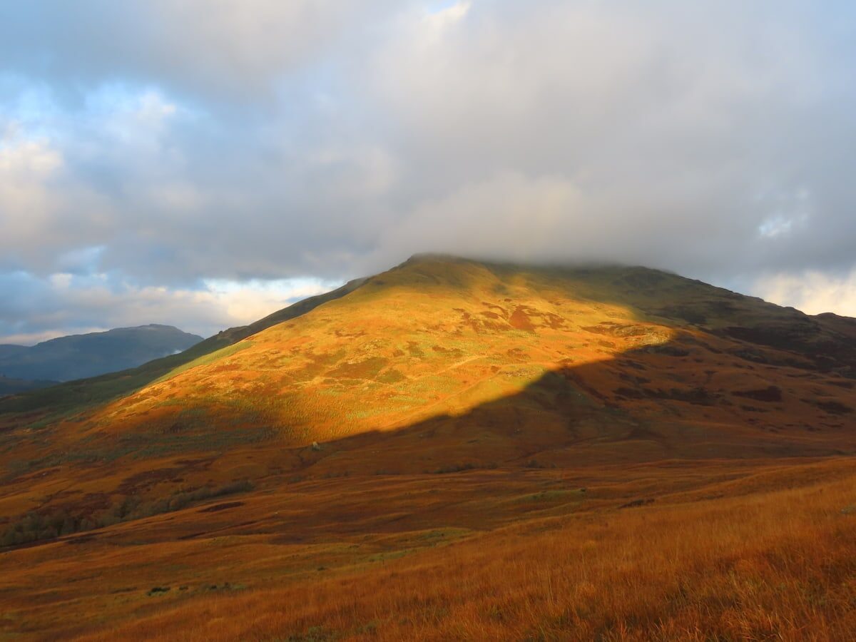 hill in sunlight & cloud