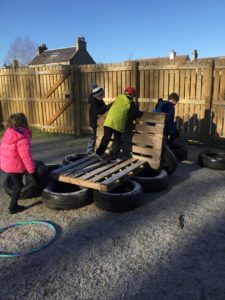 working together to build an obstacle course
