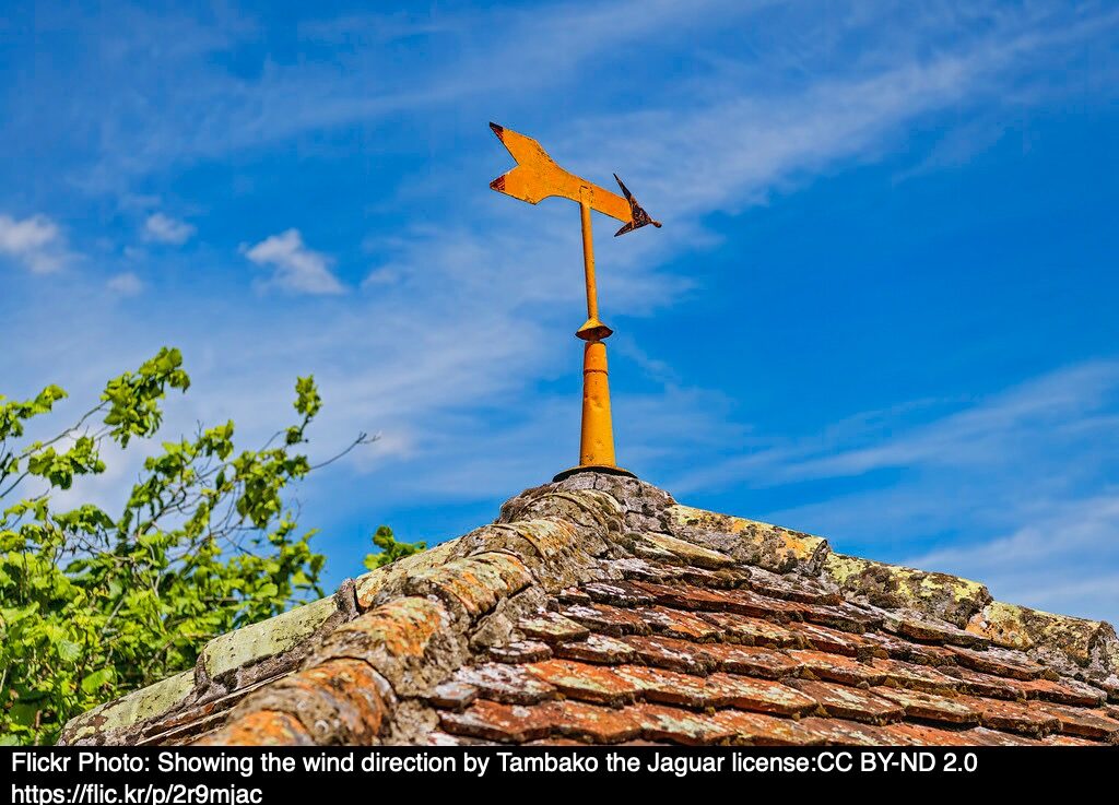 A wind vane on a roof