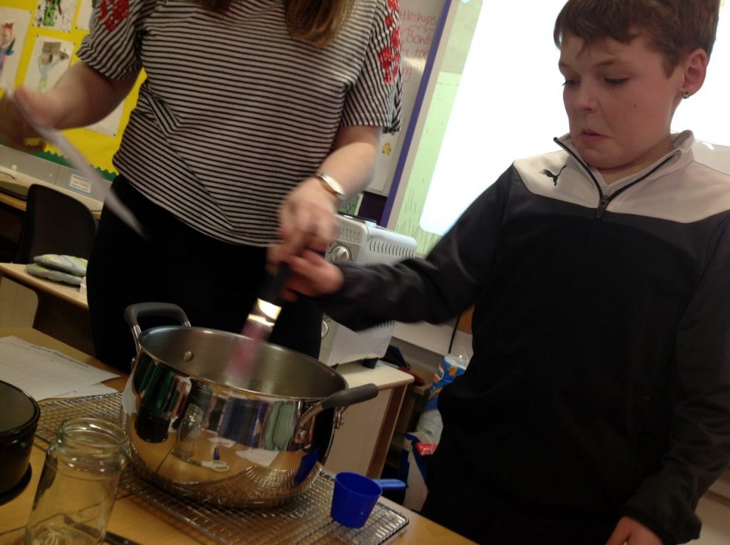 Curdling of milk is due to picture