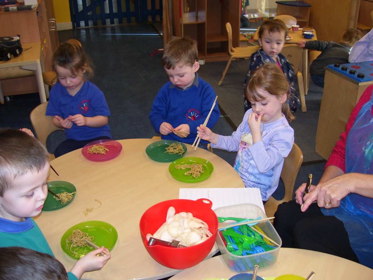 Tasting Chinese food Yum Whitdale Early Years Centre